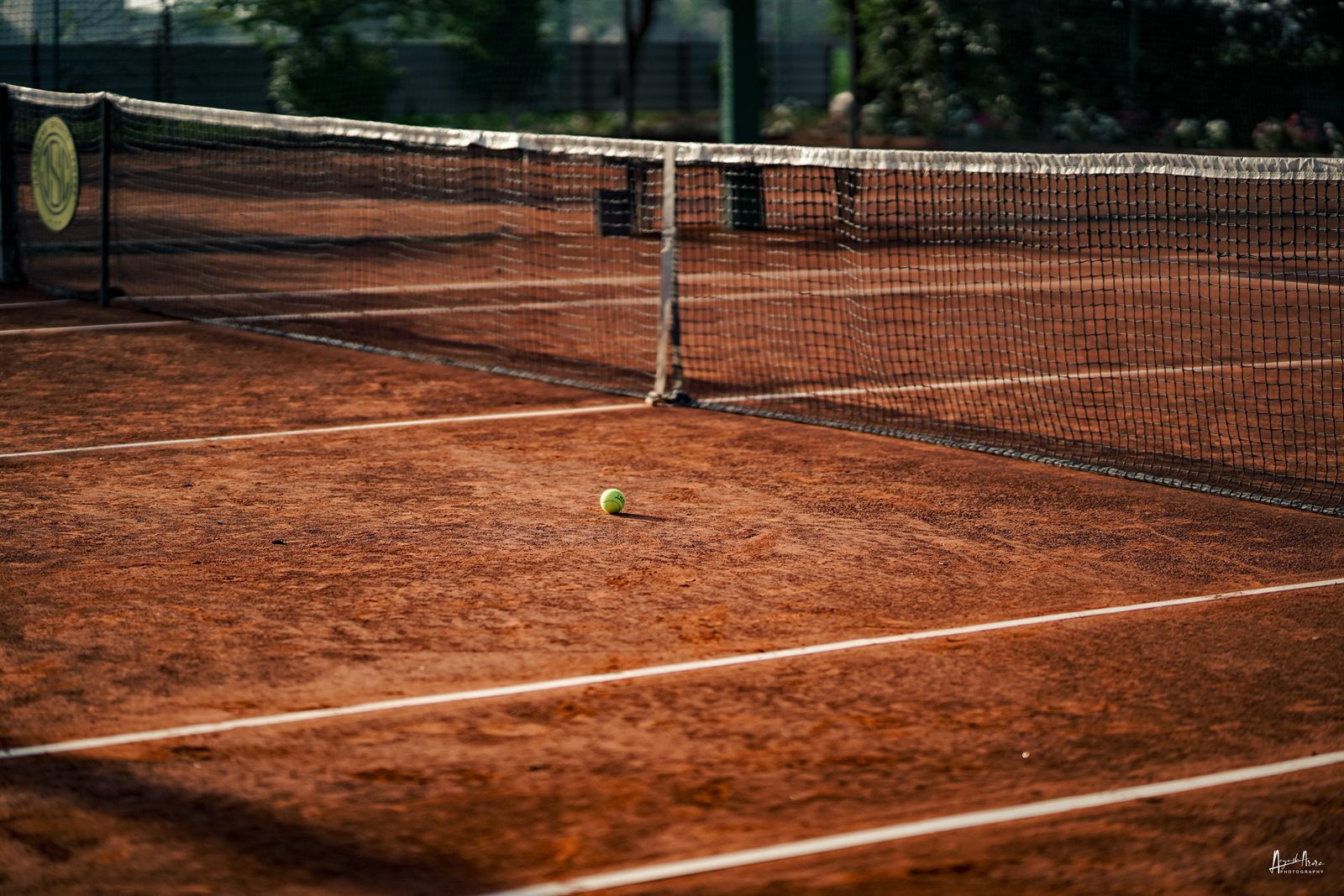 Tennis player competing during an AITA tournament